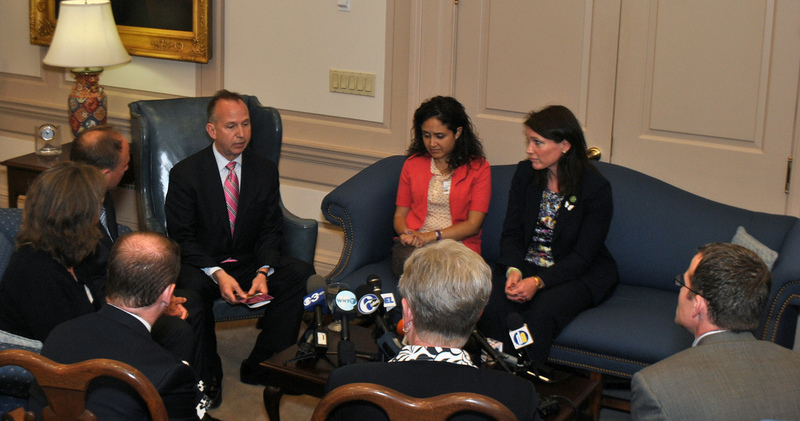 Gov. Jack Markell speaks with parents of victims of the shooting at Sandy Hook Elementary School in Newtown, Conn. Shown are (l-r) Markell, Nelba Marquez-Green, whose daughter Ana, 6, was murdered, and Nicole Hockley, whose son, Dylan, 6, was killed during the Sandy Hook shooting. BY PATRICK JACKSON